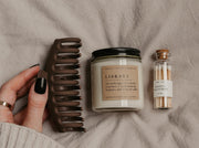 Say "Will you be my bridesmaid?" in style with this dark academia bridesmaid proposal gift box! Show your favorite bookish friends how much you appreciate their help with this thoughtful combo, featuring one Grace + Bloom literary-themed candle for them to light while they read, a decorative glass bottle of white-tipped matches, a cute claw clip to keep their hair back, and a custom-designed "Will you be my..." card that doubles as a bookmark